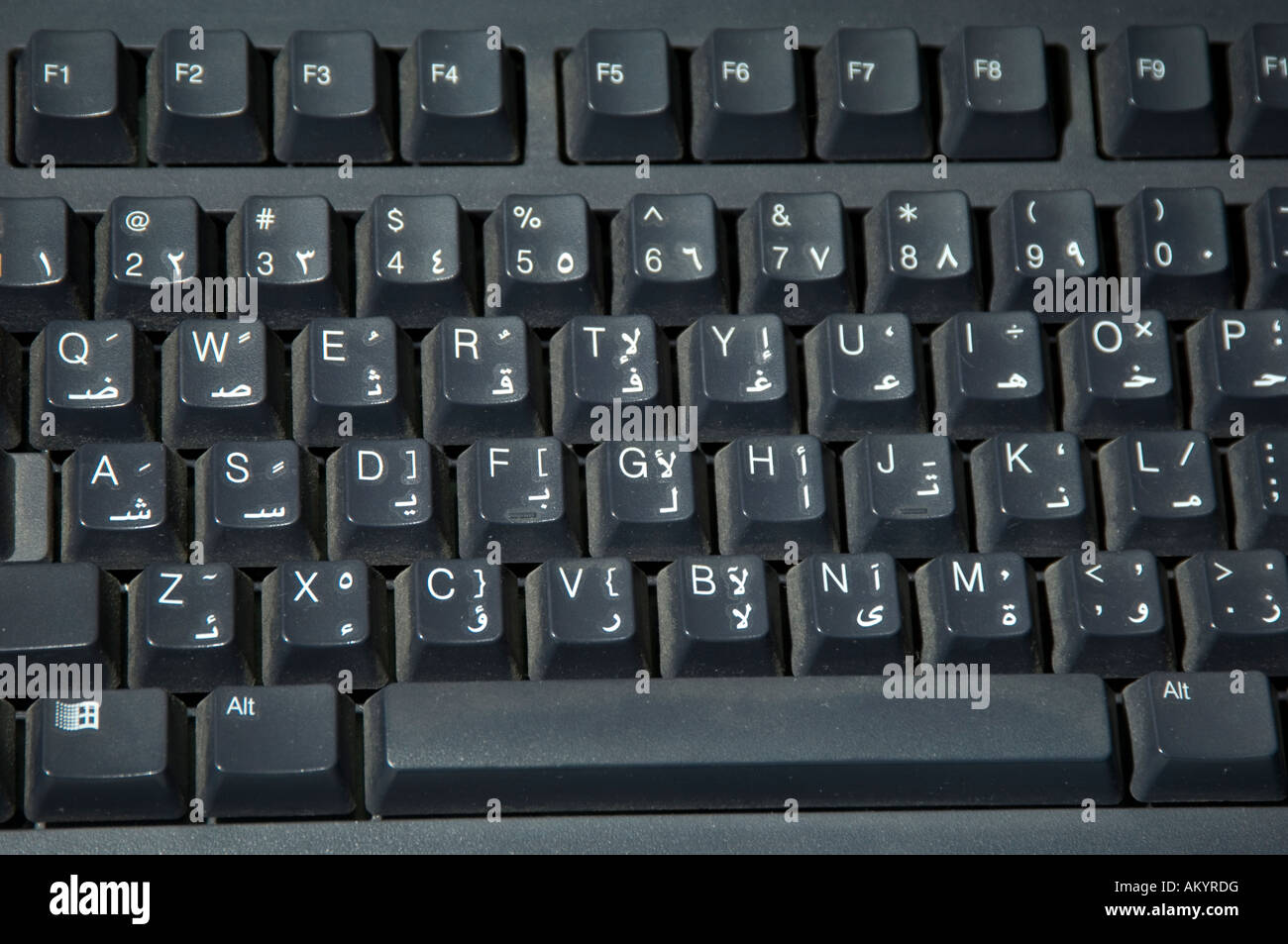 Close Up Of Arabic And English Letters Computer Keyboard Stock