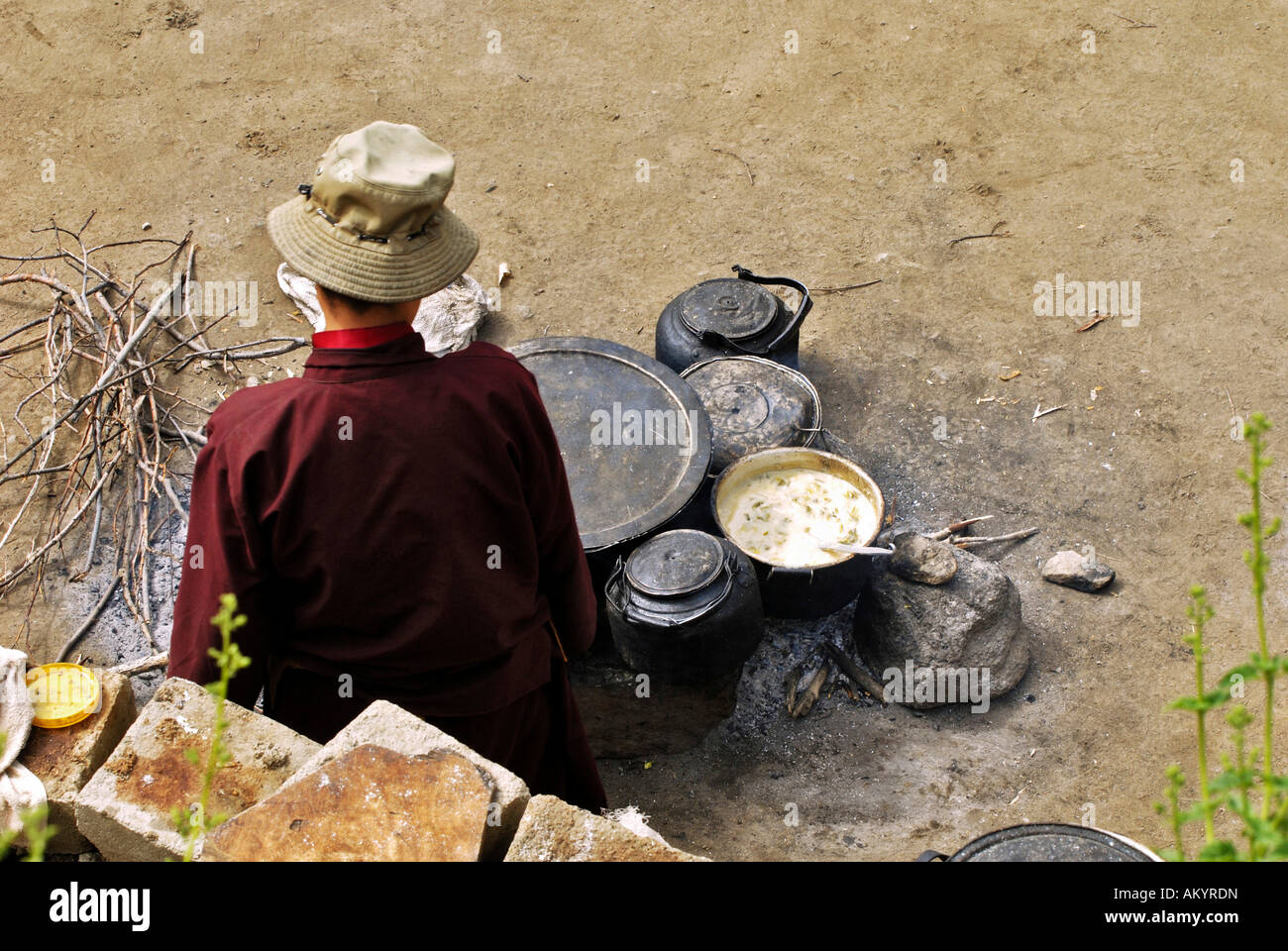 Nun, cooking area, Chim-puk Hermitage near Tsethang close to Lhasa, Tibet, Asia Stock Photo