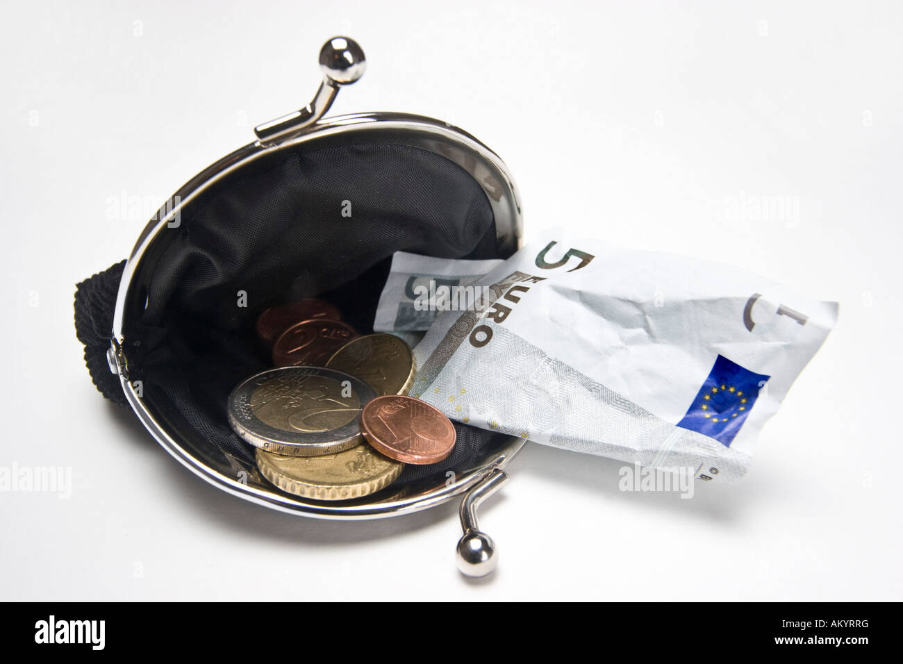 Purse with coins and banknote Stock Photo