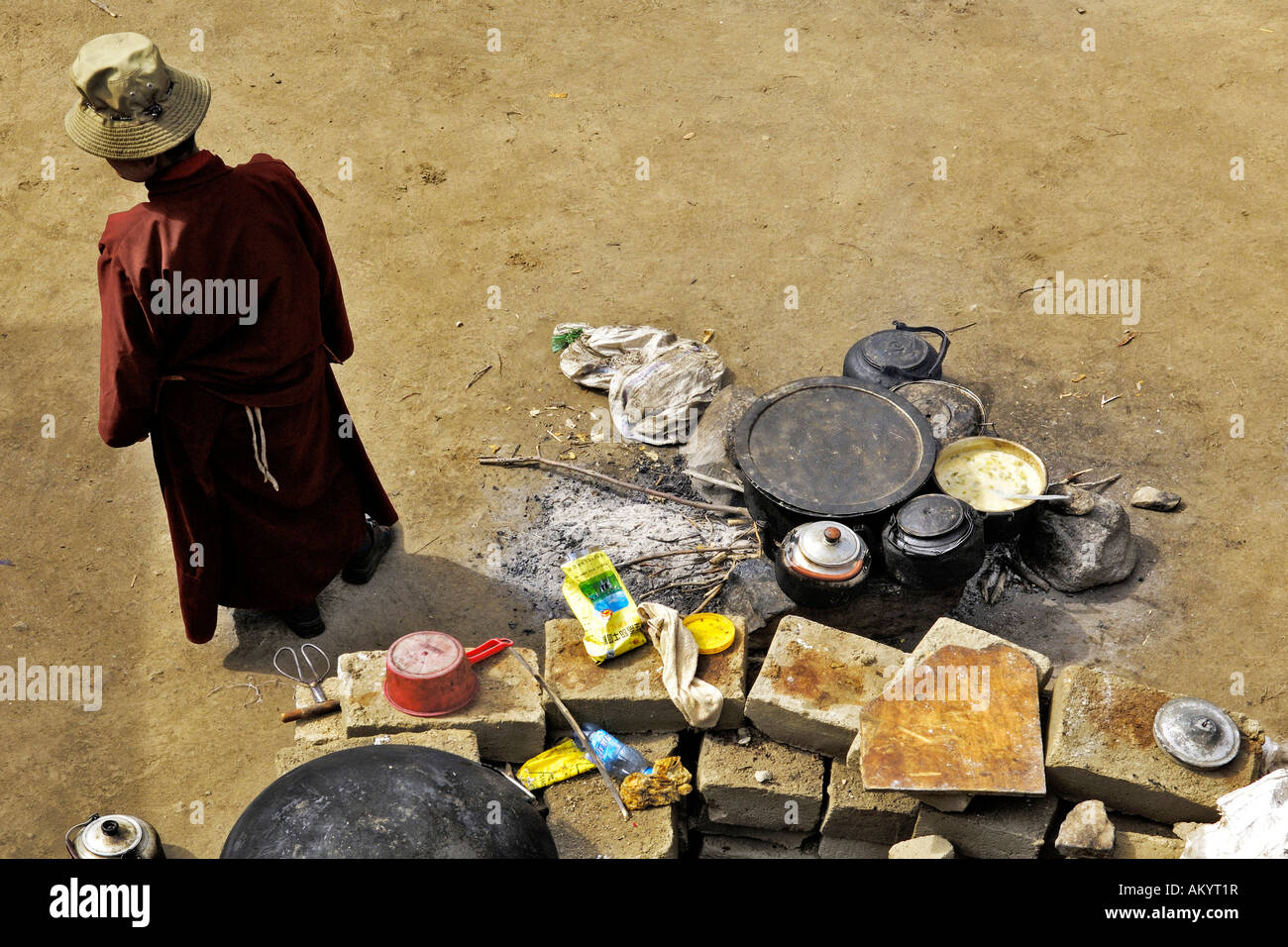 Nun und cooking area, Chim-puk Hermitage near Tsethang close to Lhasa, Tibet, Asia Stock Photo