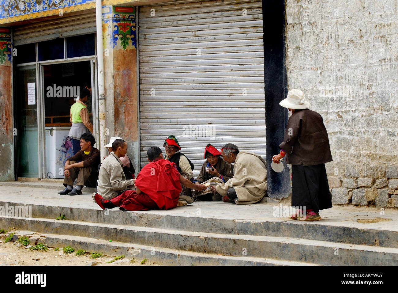Friar and pilgrims, Samye monastery near Lhasa, Tibet, Asia Stock Photo