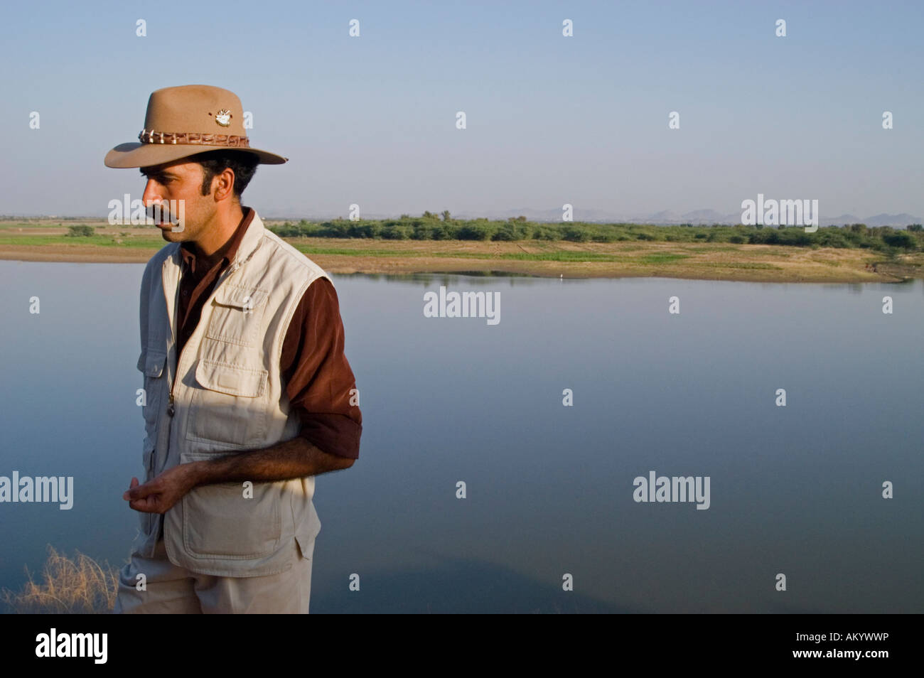 Harsh Singh, owner of Chhatra Sagar and grandson of the former Maharaja of Nimaj, speaks to guests on the camp grounds - Stock Image