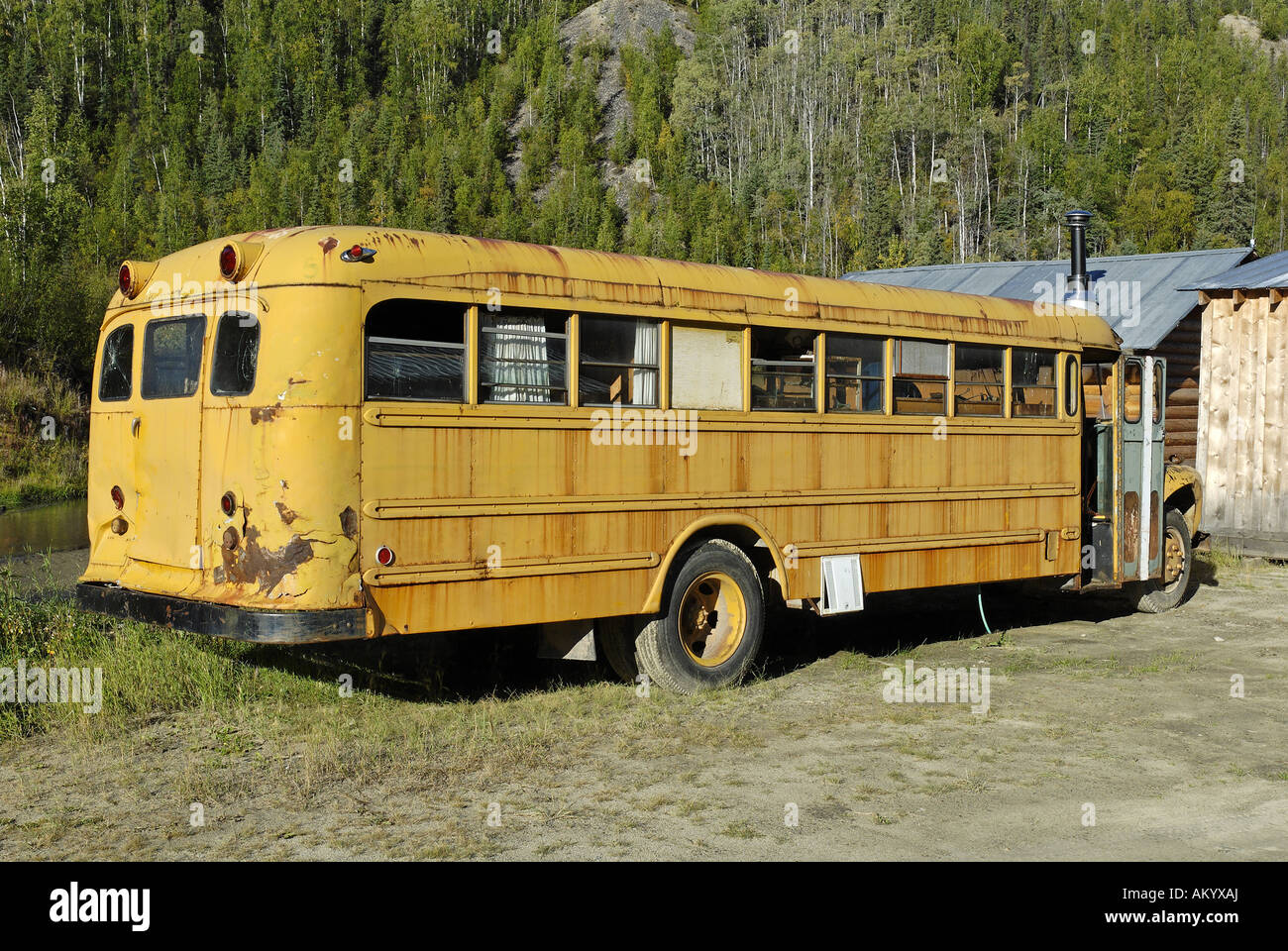 Old schoolbus, Dawson City, Yukon Territory, Canada Stock Photo