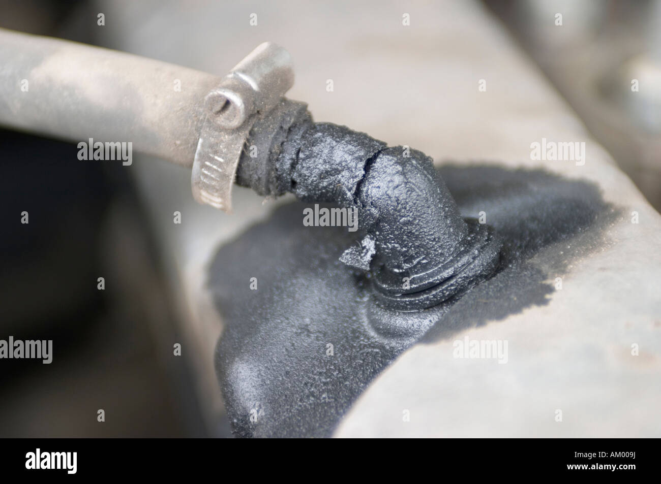 Oil leakage on an engine Stock Photo Alamy
