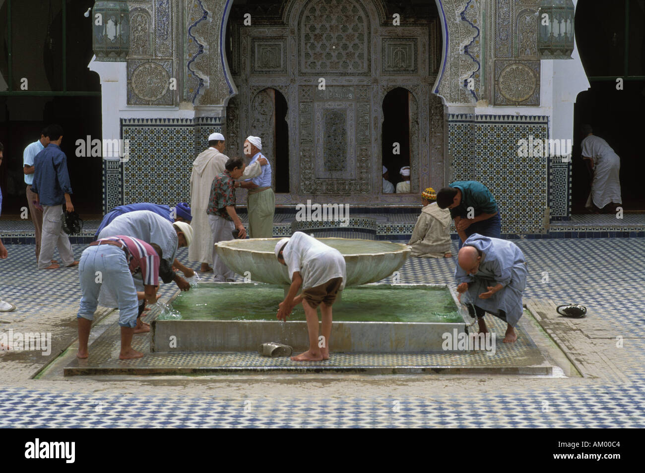Muslim washing before prayer hi-res stock photography and images - Alamy