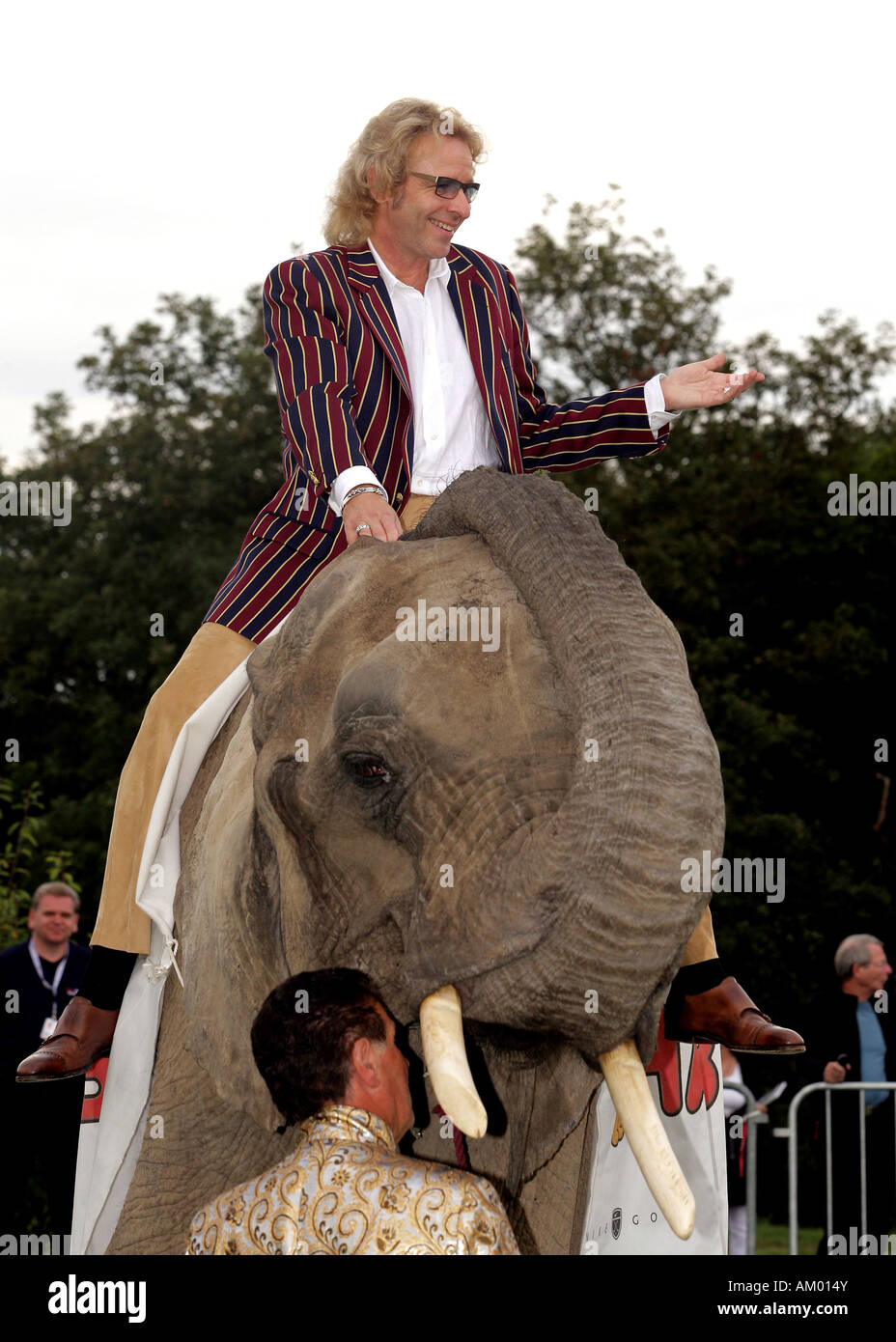 Showmaster Thomas Gottschalk riding an elephant Stock Photo