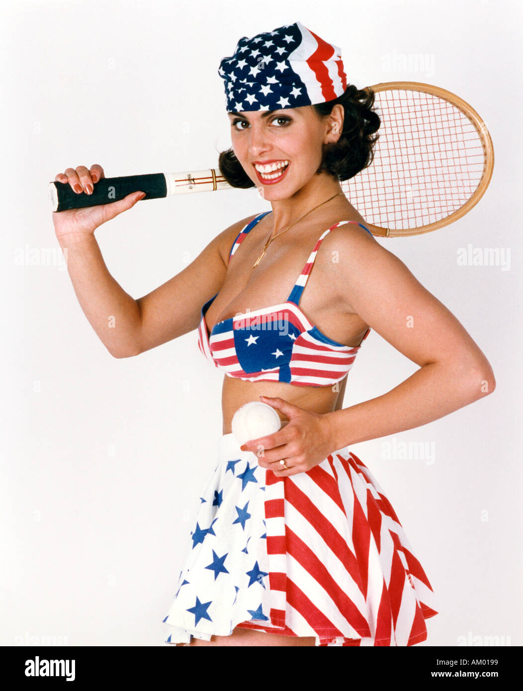 Girl in USA Tennis Outfit and a Tennis Raquet Stock Photo