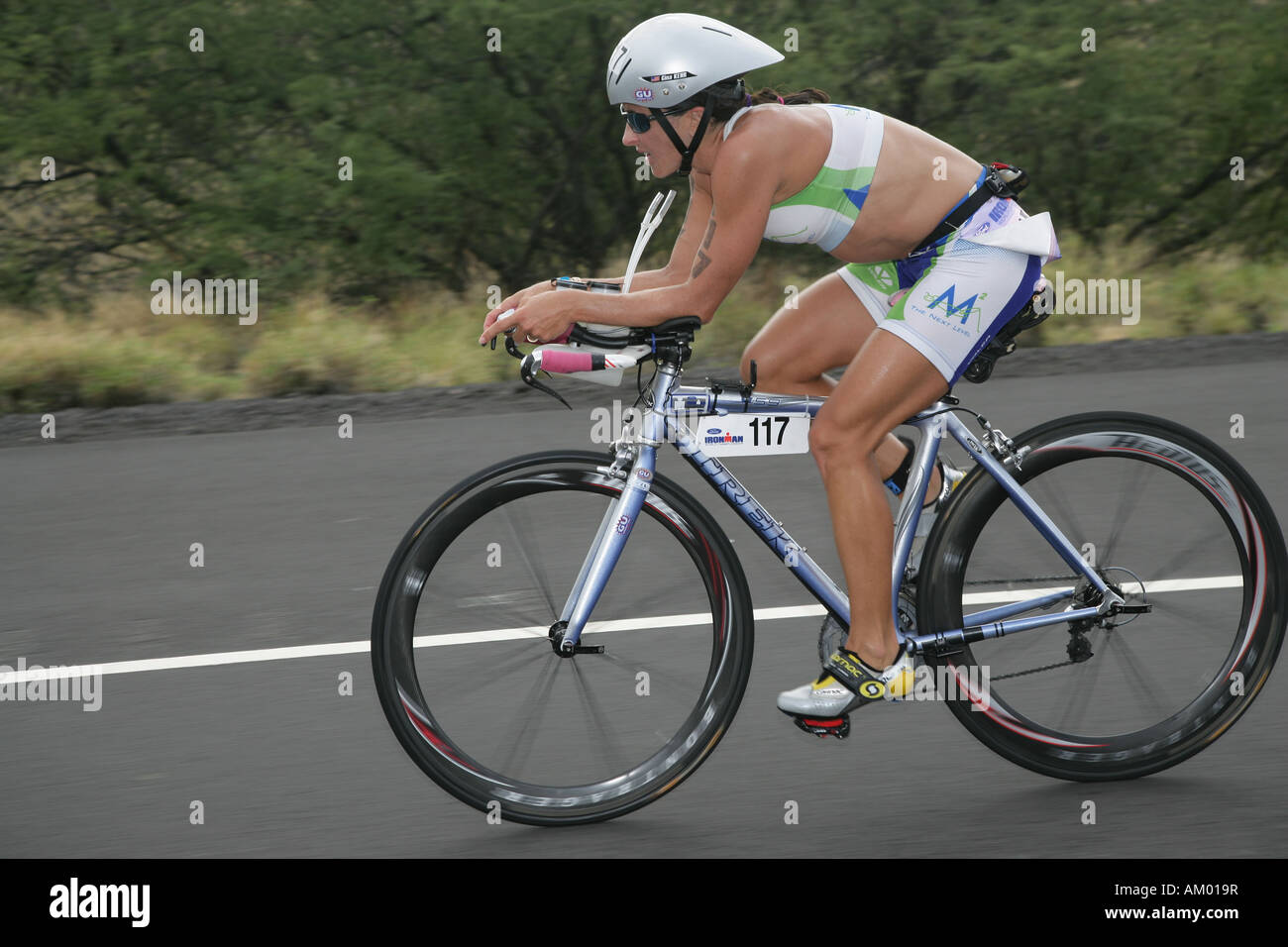 Triathlet Gina Kehr at the bike in Hawaii, USA Stock Photo