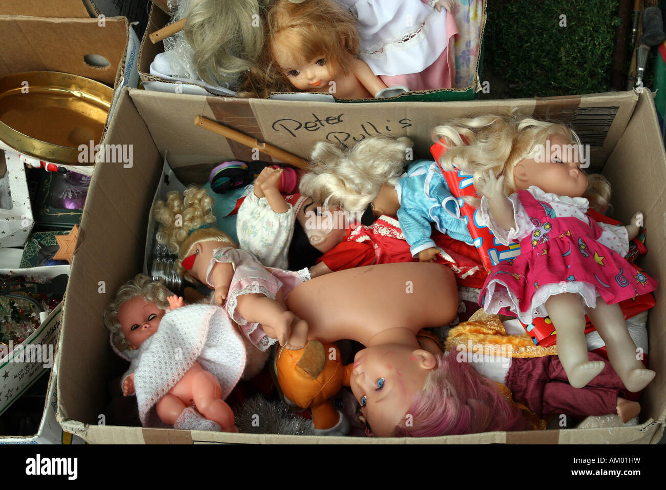 Dolls in a box Stock Photo