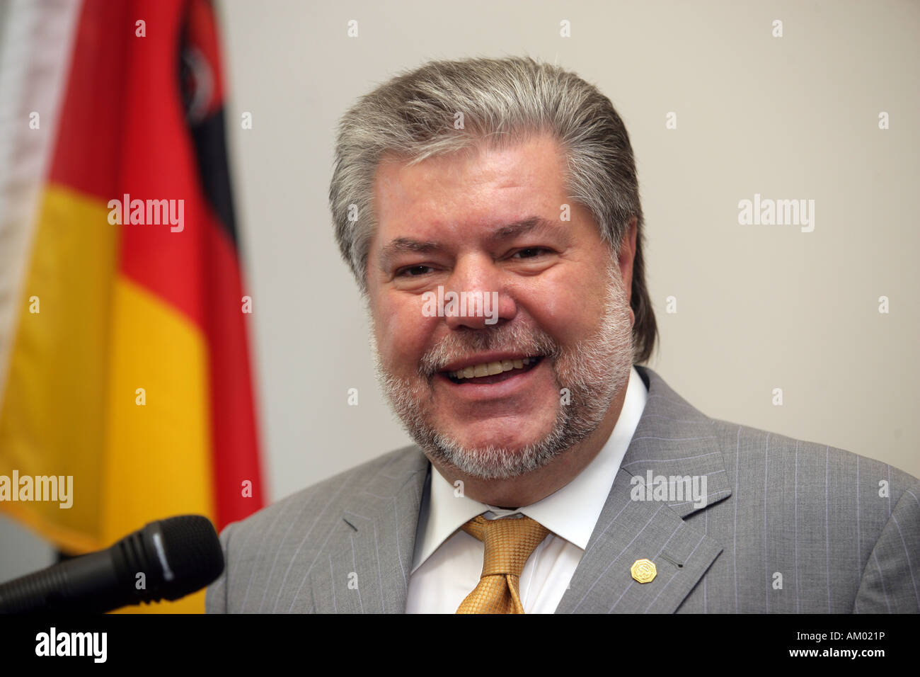 Kurt Beck, prime minister in rhineland-palatinate and SPD Chairman with the german banner Stock Photo