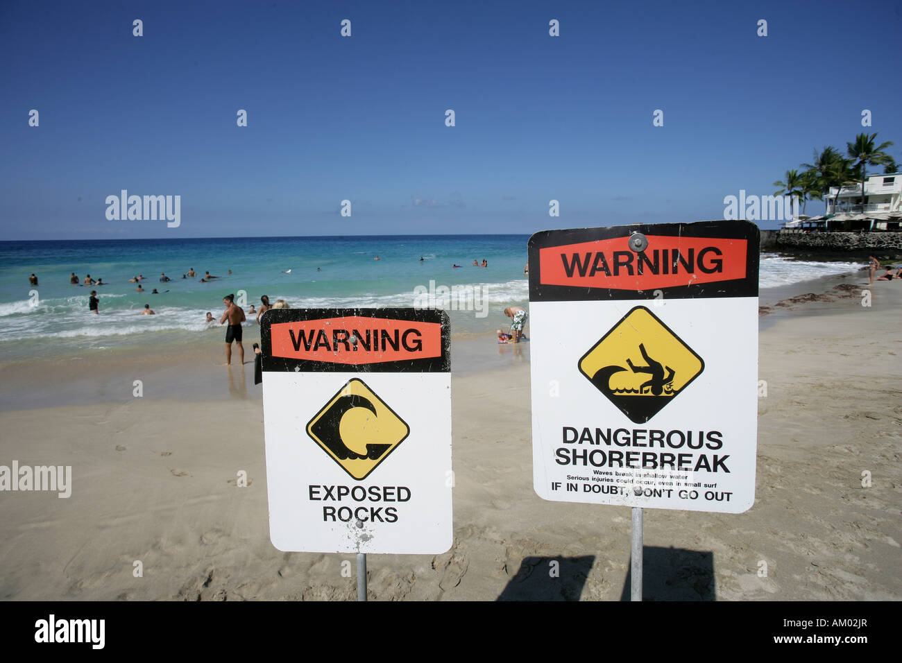 Warning sign at the White Sands Beach in Kailua Kona, Hawaii USA Stock Photo