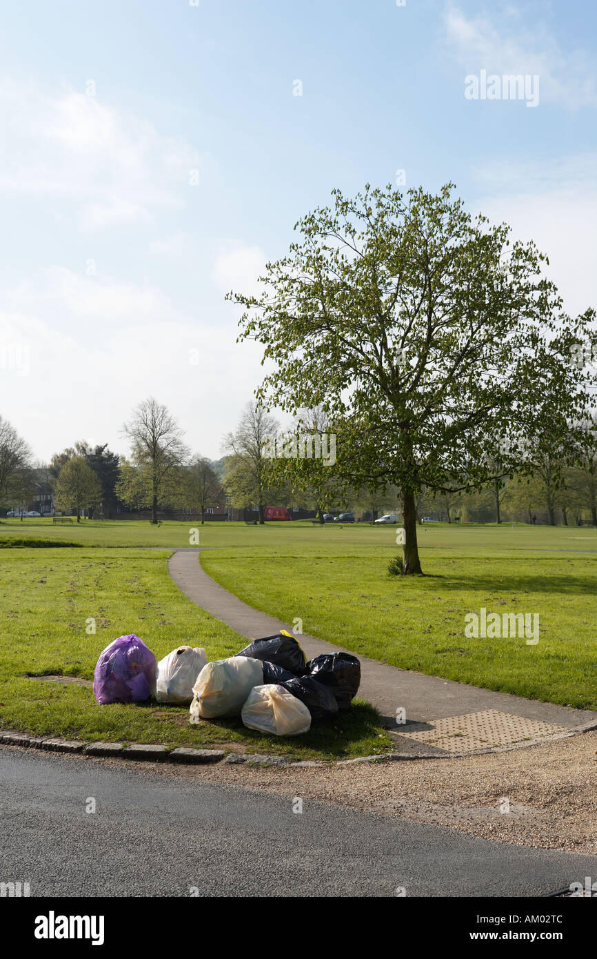 Views of a beautiful village showing ugly refuse sacks put out for collection Stock Photo