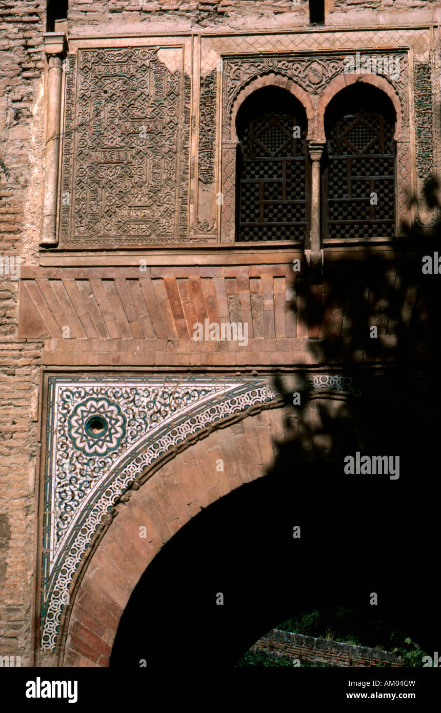 Detail of carved stucco and tiled decoration on the Puerta del Vino, Alhambra Palace Granada Spain Stock Photo