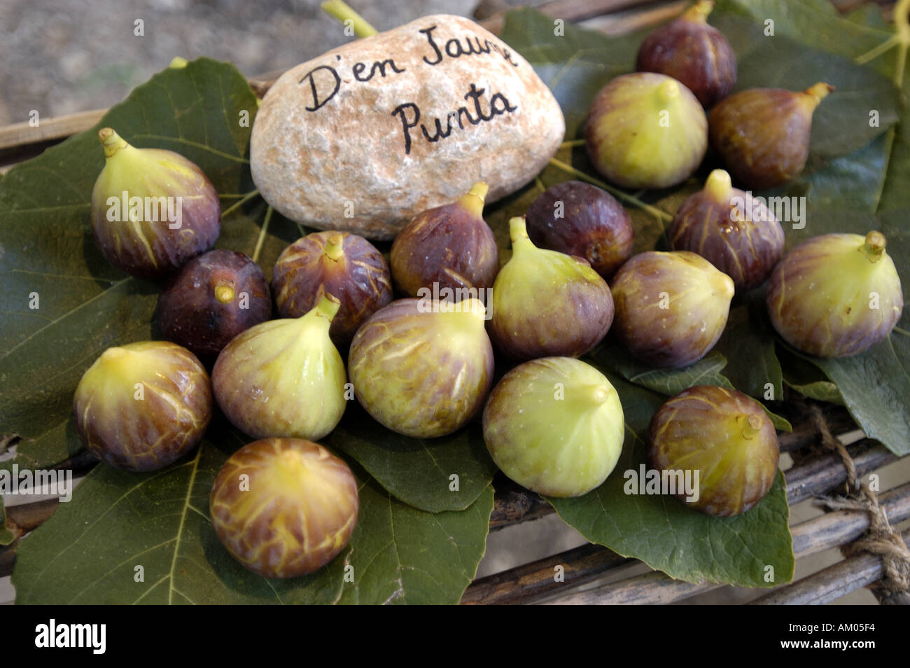 Various types of Figs on display at an outdoor stand Stock Photo Alamy