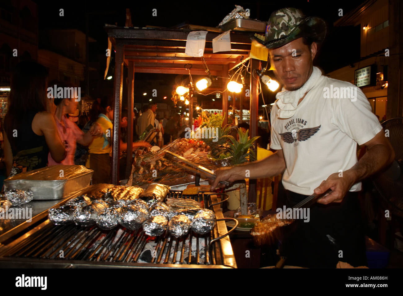 Chef Serving Barbeque Food, Outdoor Restaurant, Hua Hin, Thailand Stock Photo