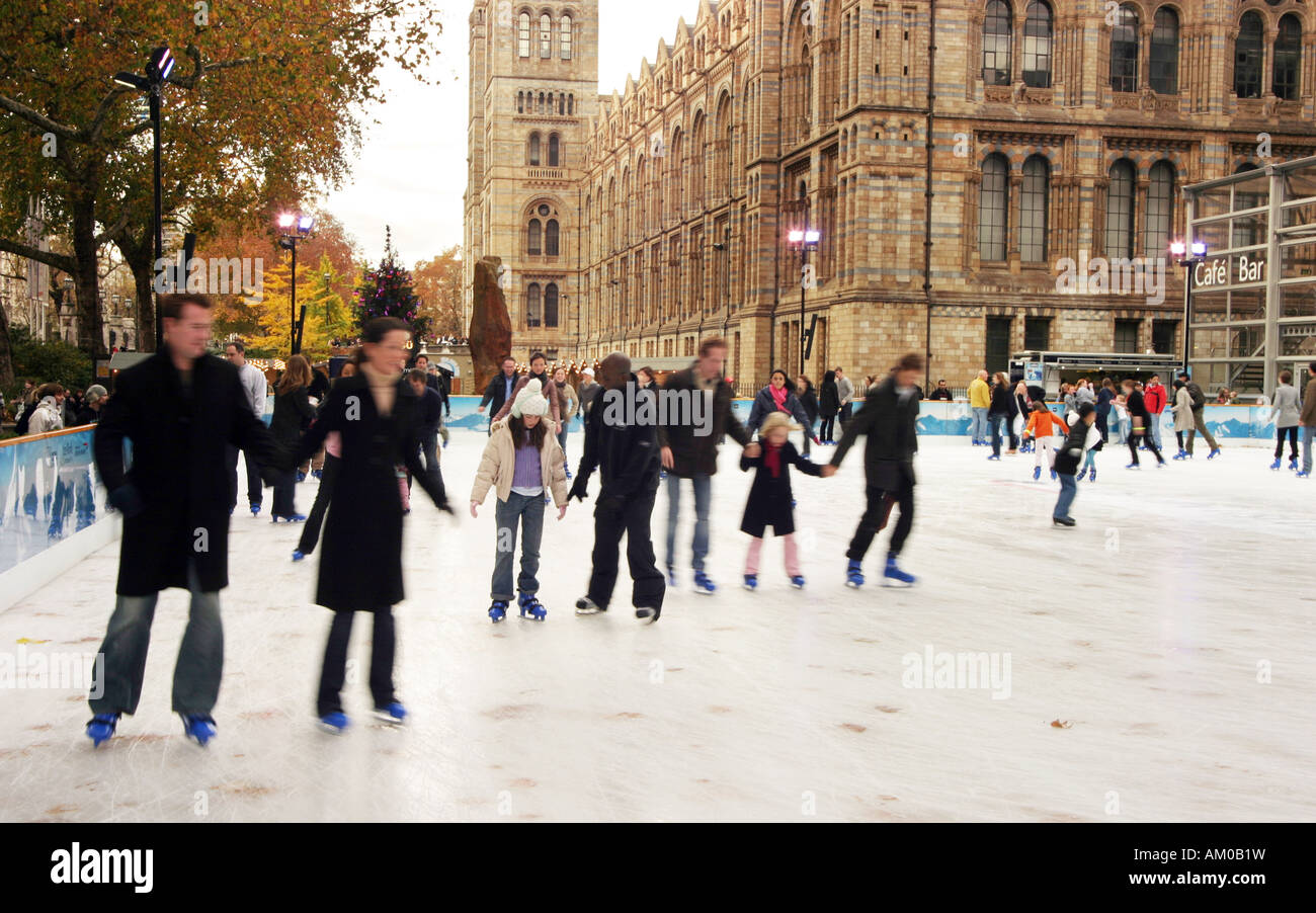 People Ice skating, Natural History Museum, London England Stock Photo