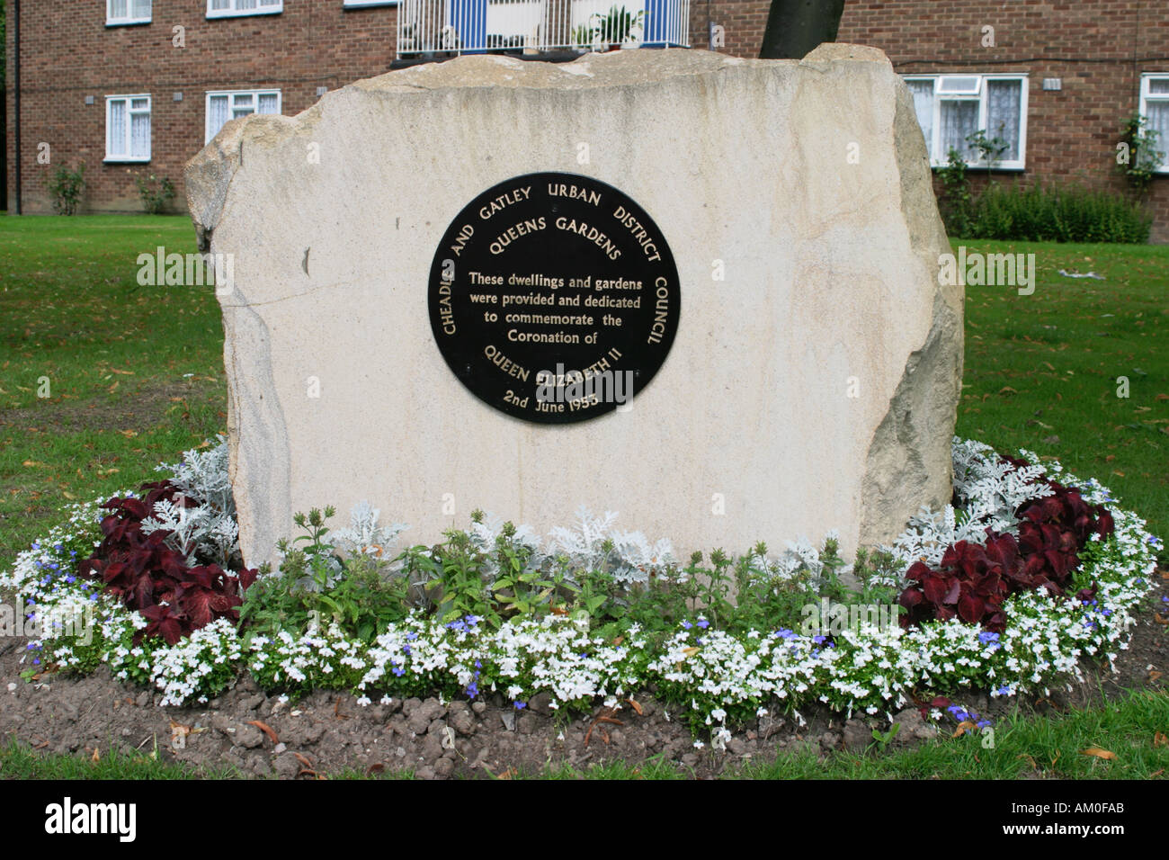 Queens Garden's, Cheadle Village, Stockport, Cheshire. The plaque says
