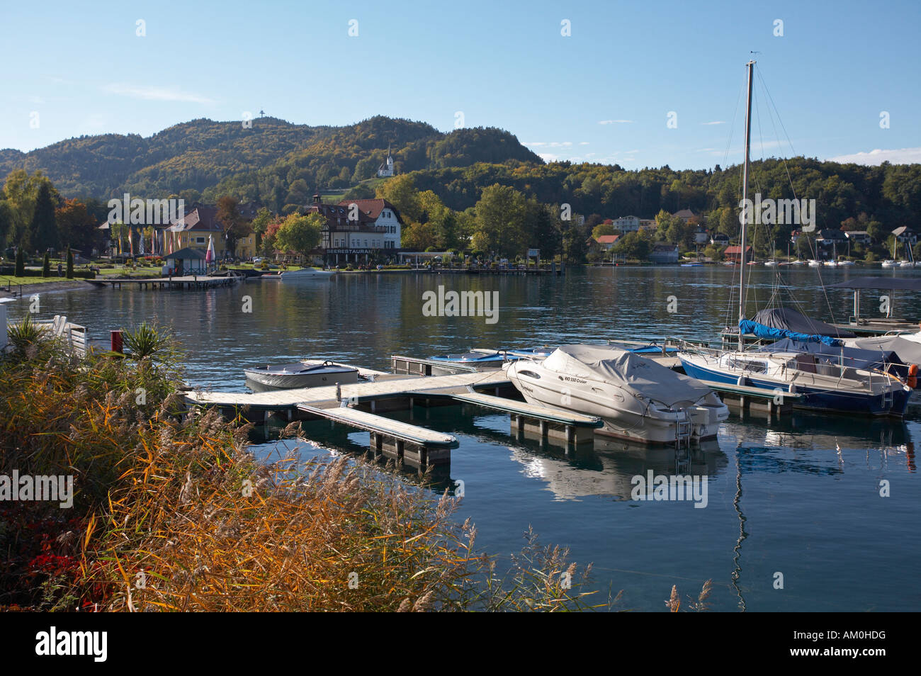 Boat jetty in Reifnitz in late summer, Woerthersee, Carinthia, Austria Stock Photo