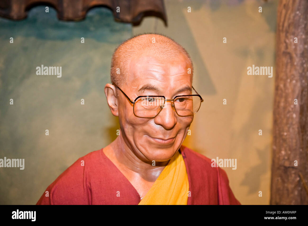 Dalai Lama Tenzin Gyatso as a wax figure Wax museum of Prague Czechia Stock Photo