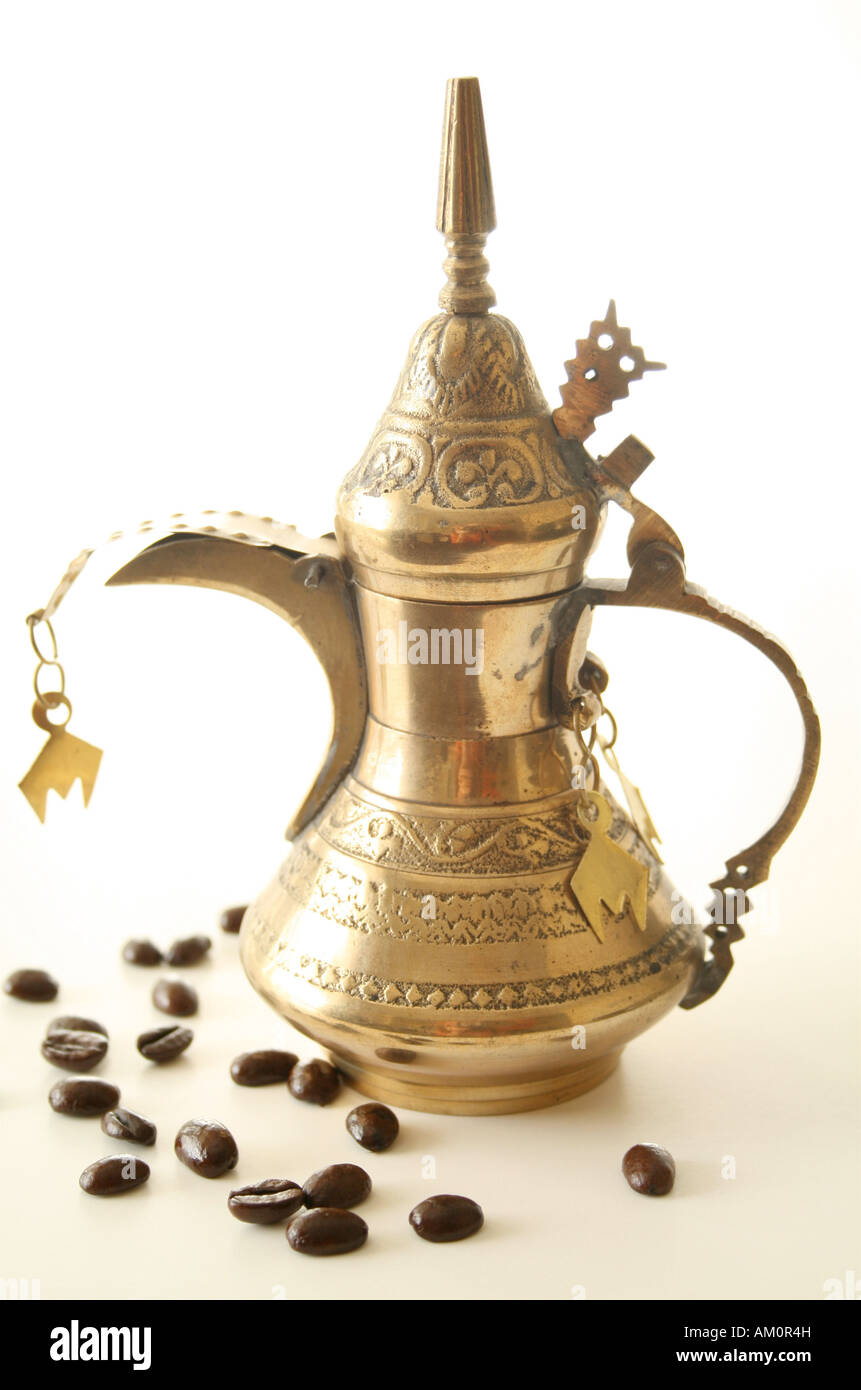 Arabic Coffee Pot With Coffee Beans Stock Photo