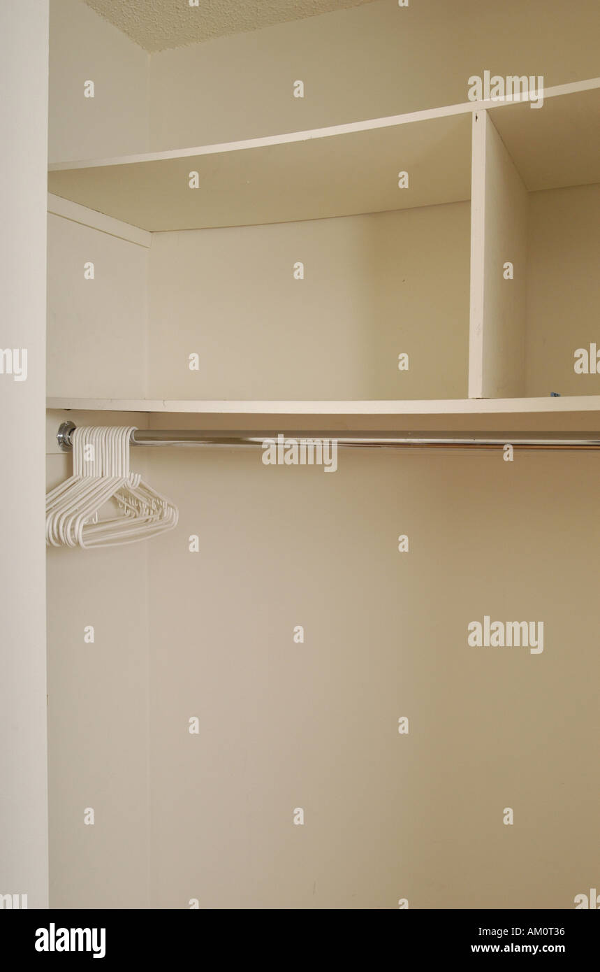 shelf wardrobe built in wardrobe rail clothes rail clothes pole hanger rack store storage attire garments apparel Stock Photo Alamy