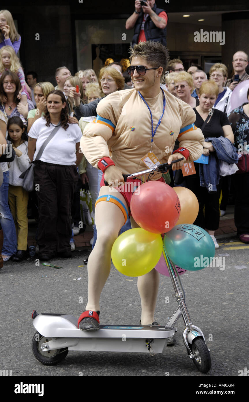 gay pride parade mardi gras manchester 2006 colour color vertical man muscleman suit fancy dress performer deansgate fun funny h Stock Photo Alamy