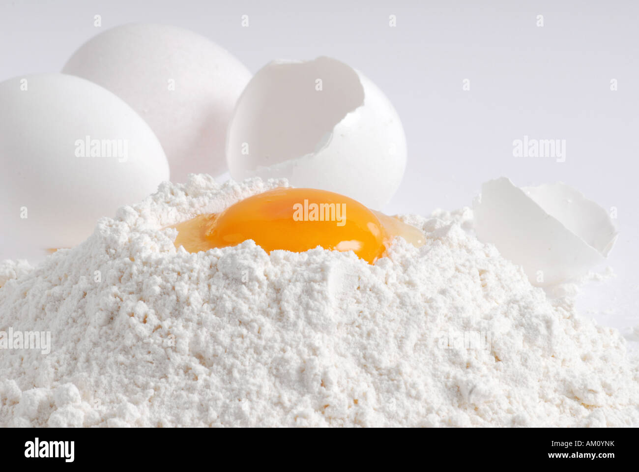 Egg in flour Stock Photo