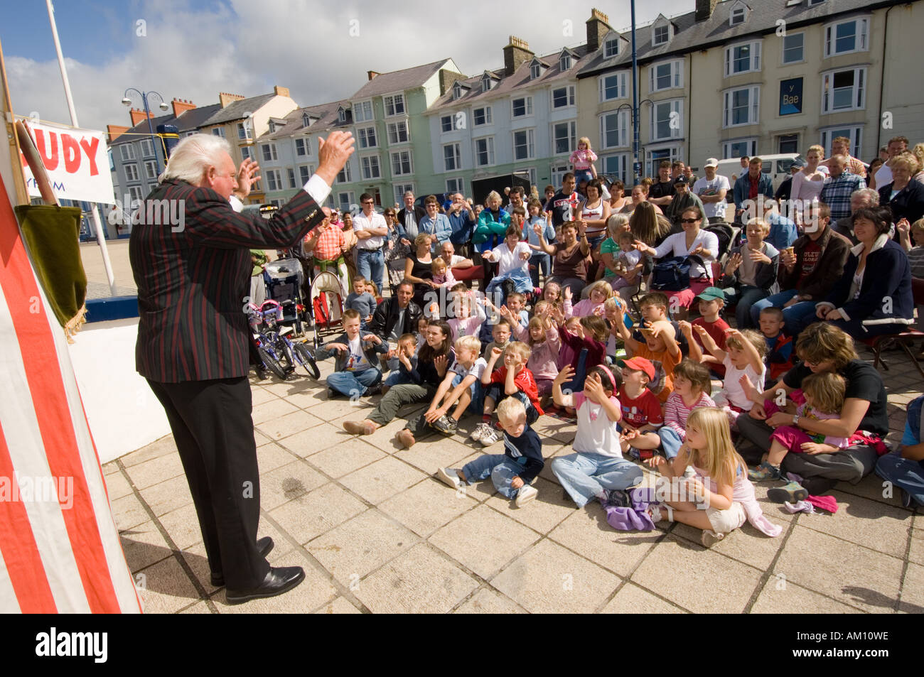 a man entertaining children at the Aberystwyth Punch and Judy festival