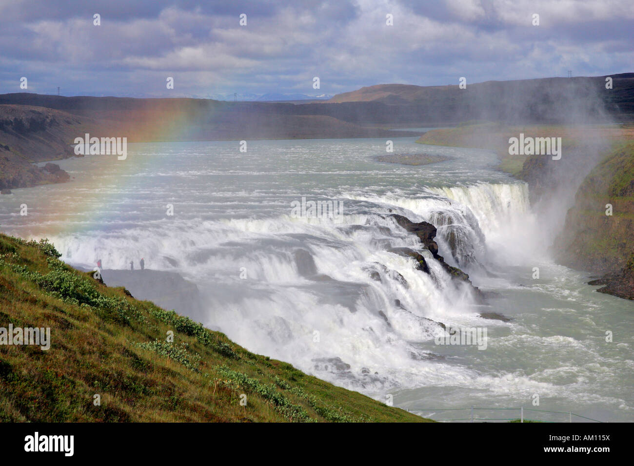 Gullfoss-waterfall at the Hvita-river in Iceland with rainbow in evening light - Iceland, Europe Stock Photo