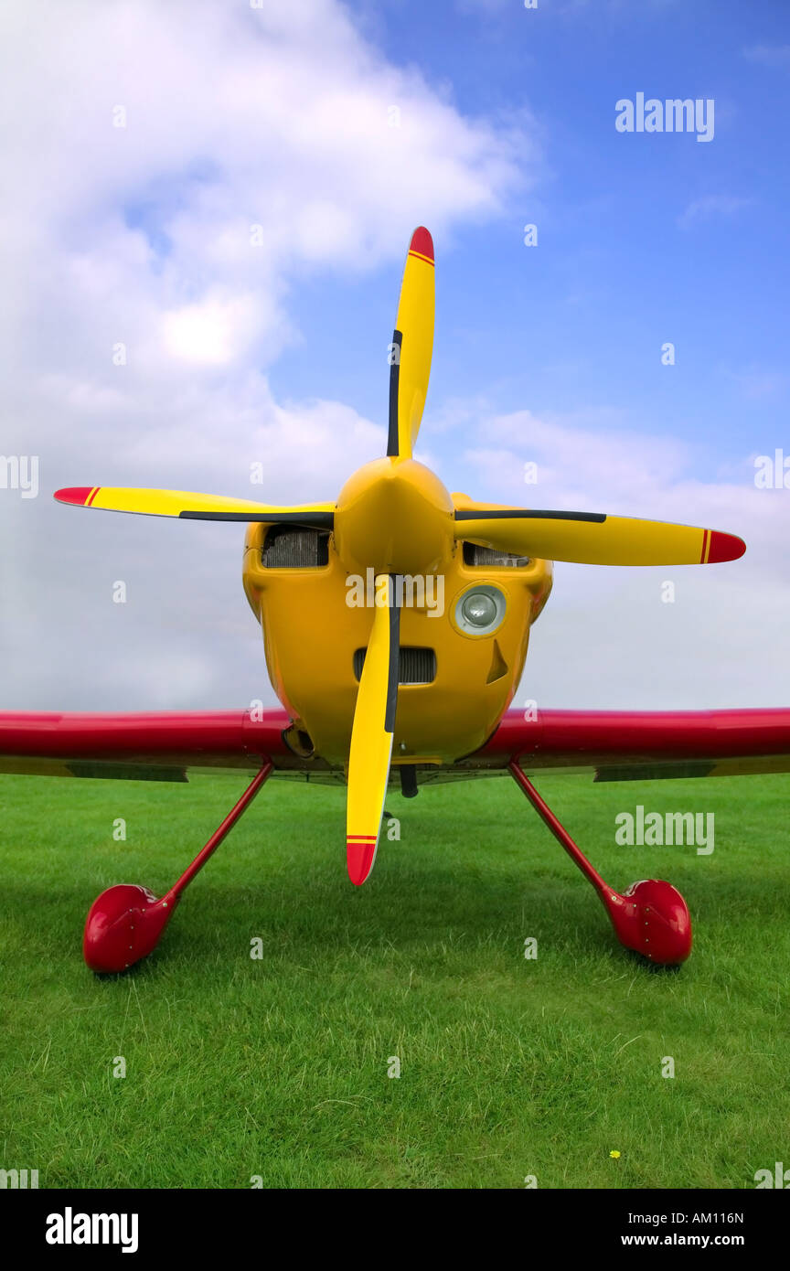 Red and Yellow single prop aeroplane close up Stock Photo