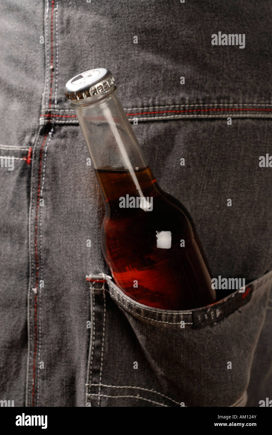 Bottle with alcohol in a pocket Stock Photo