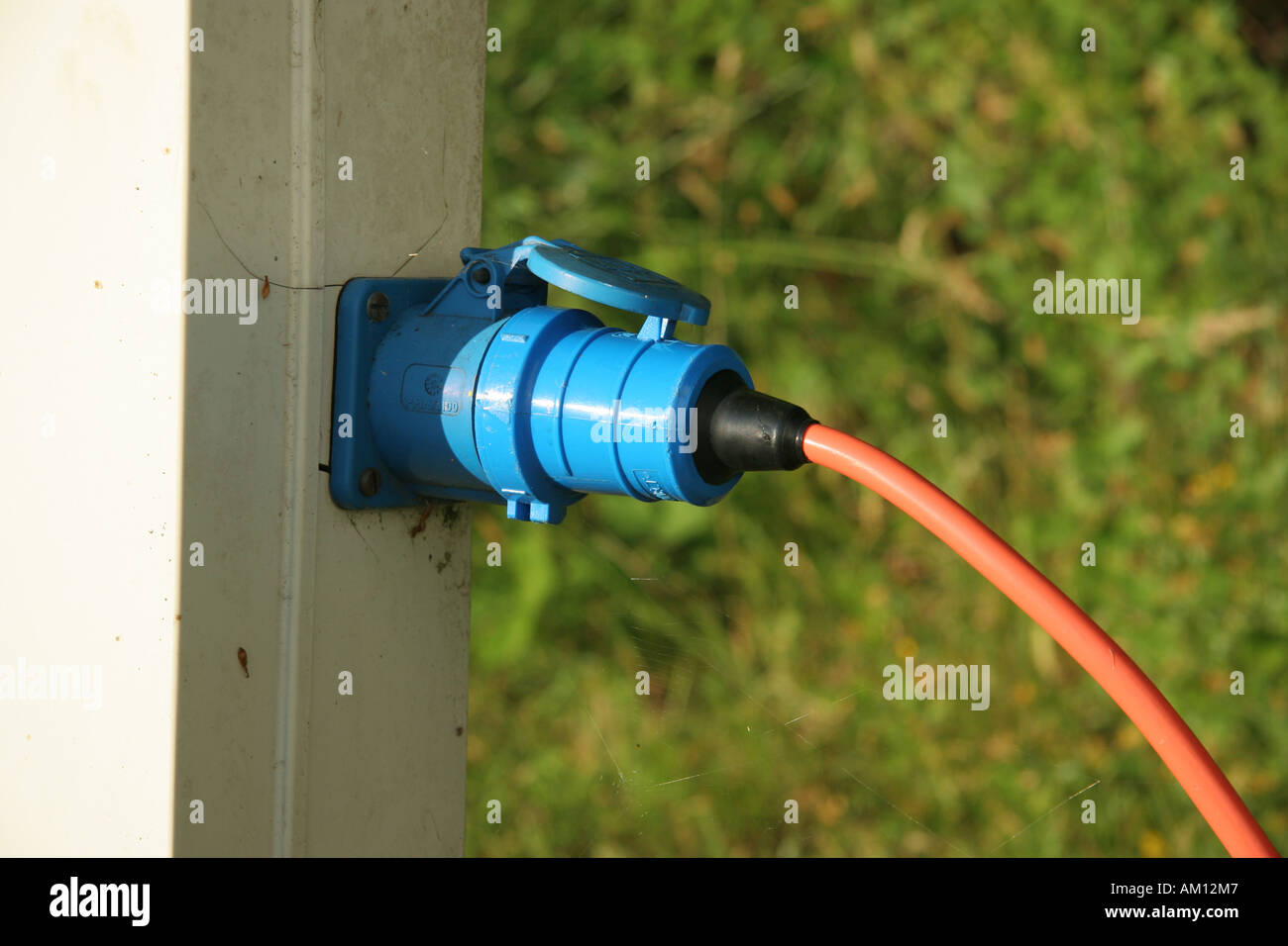 Camping electric hook up Stock Photo - Alamy