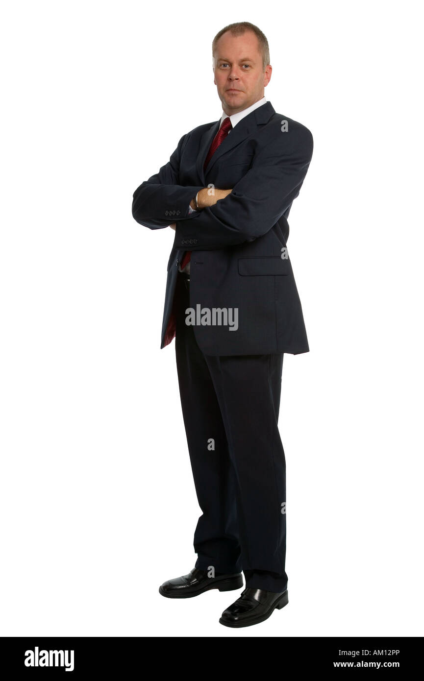 Confident businessman wearing a suit with his arms folded Stock Photo