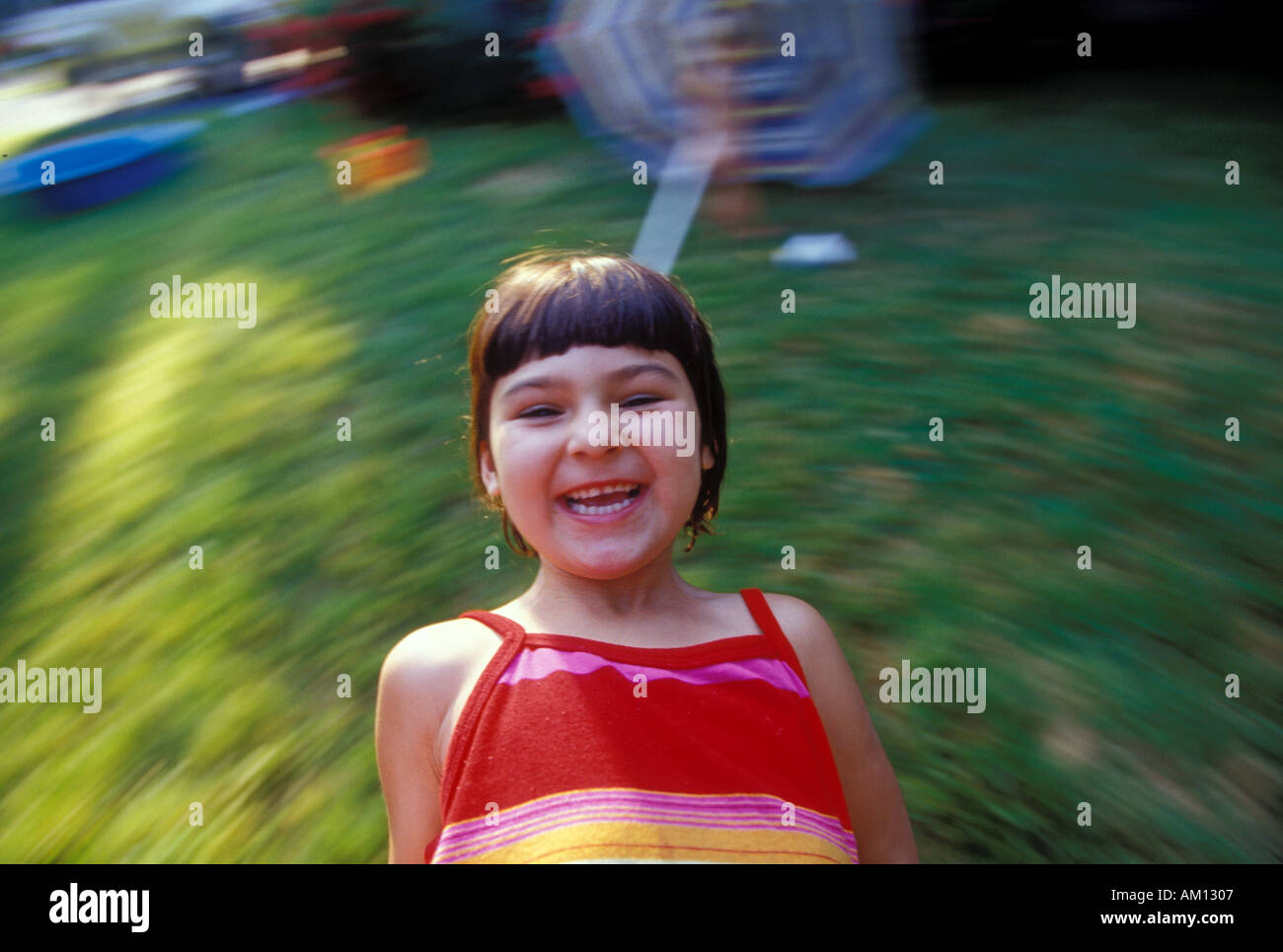 Girl Playing With Father Stock Photo