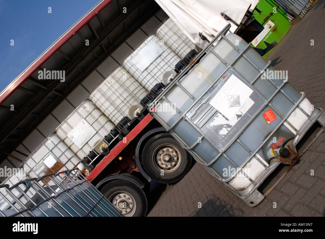 IBC container waiting for loading onto a lorry. Stock Photo
