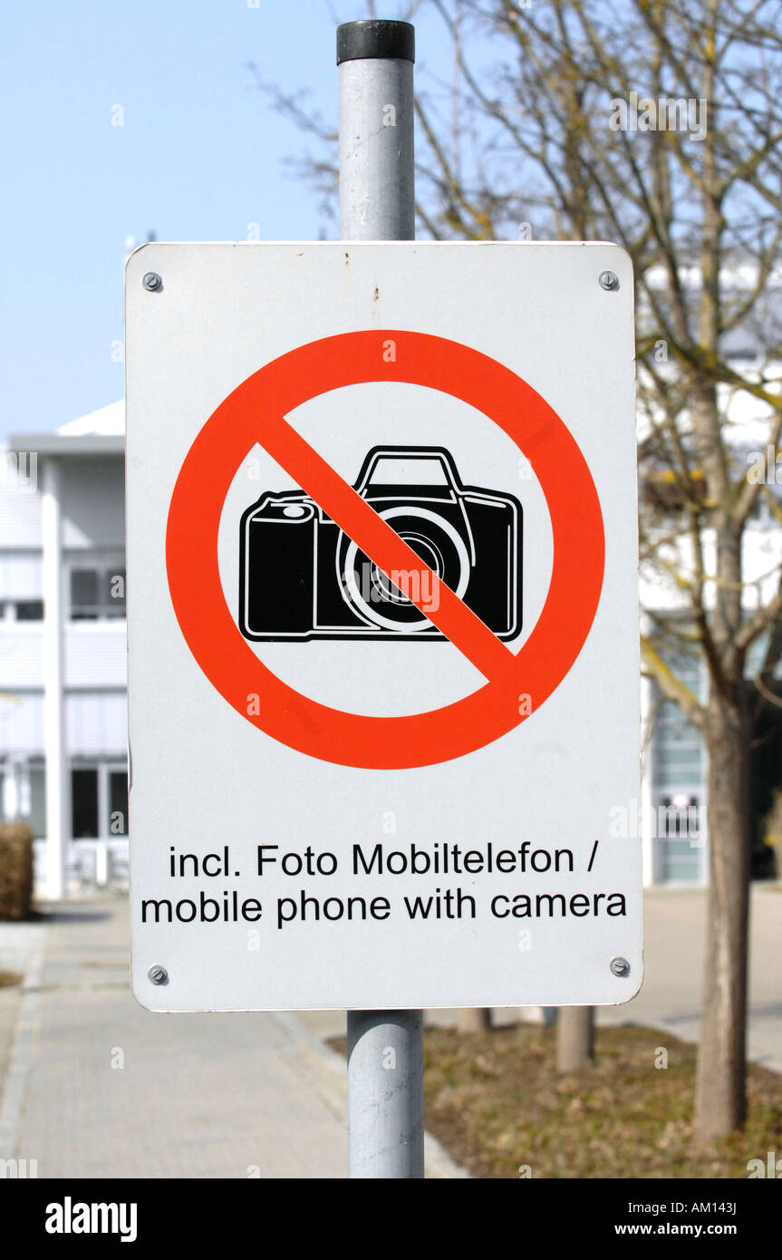 Factory premises - sign: It is restricted to take pictures even with mobile phone'. Stock Photo