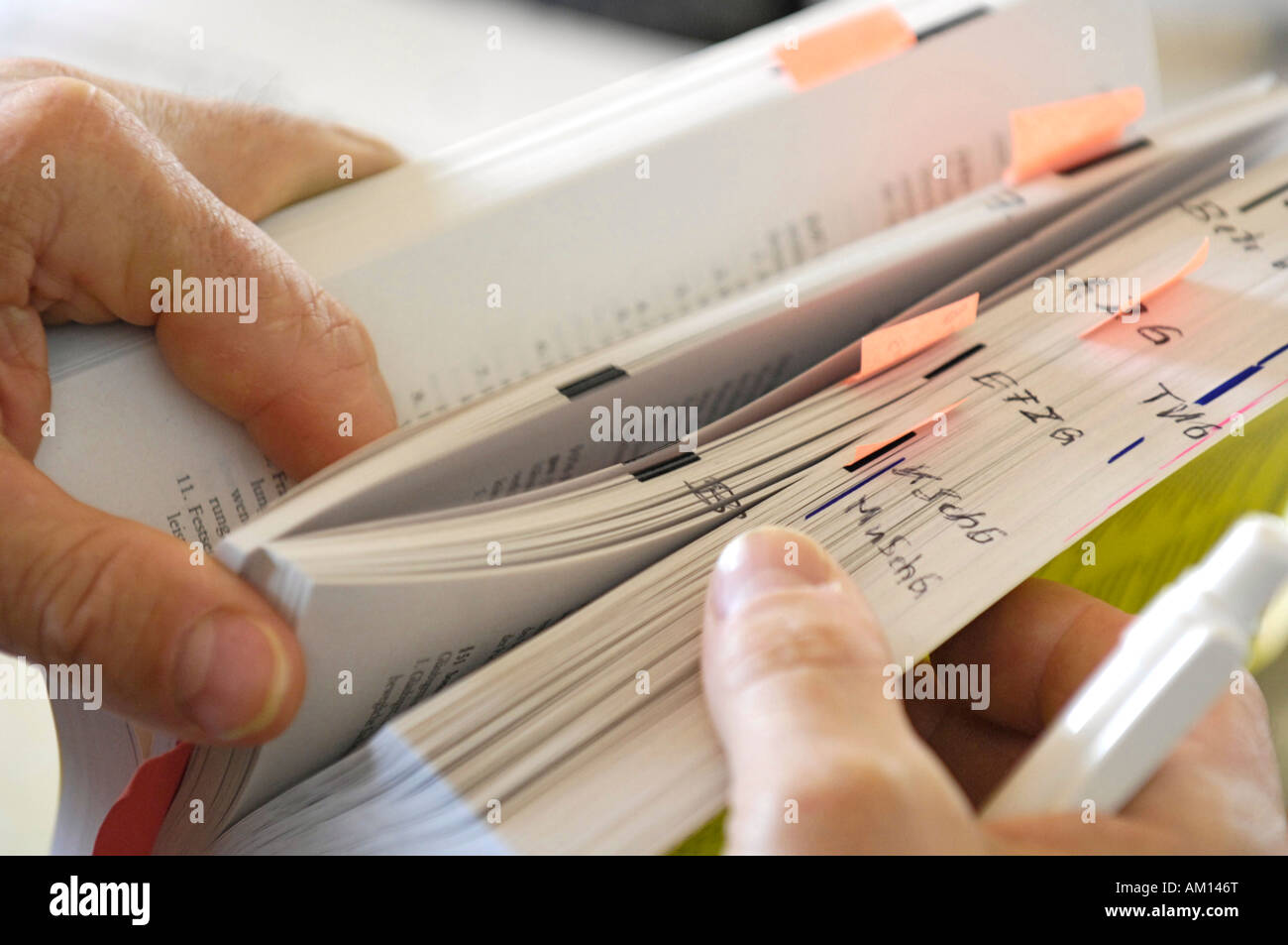 Book of laws with marker. Workers' council training. Stock Photo