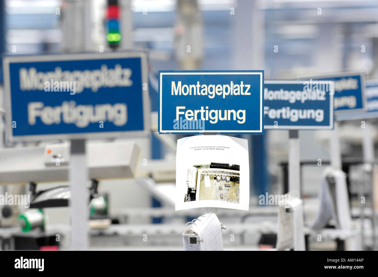 Sign: ' Working place assambly', Loewe AG - production of television receiver, Kronach, Germany Stock Photo