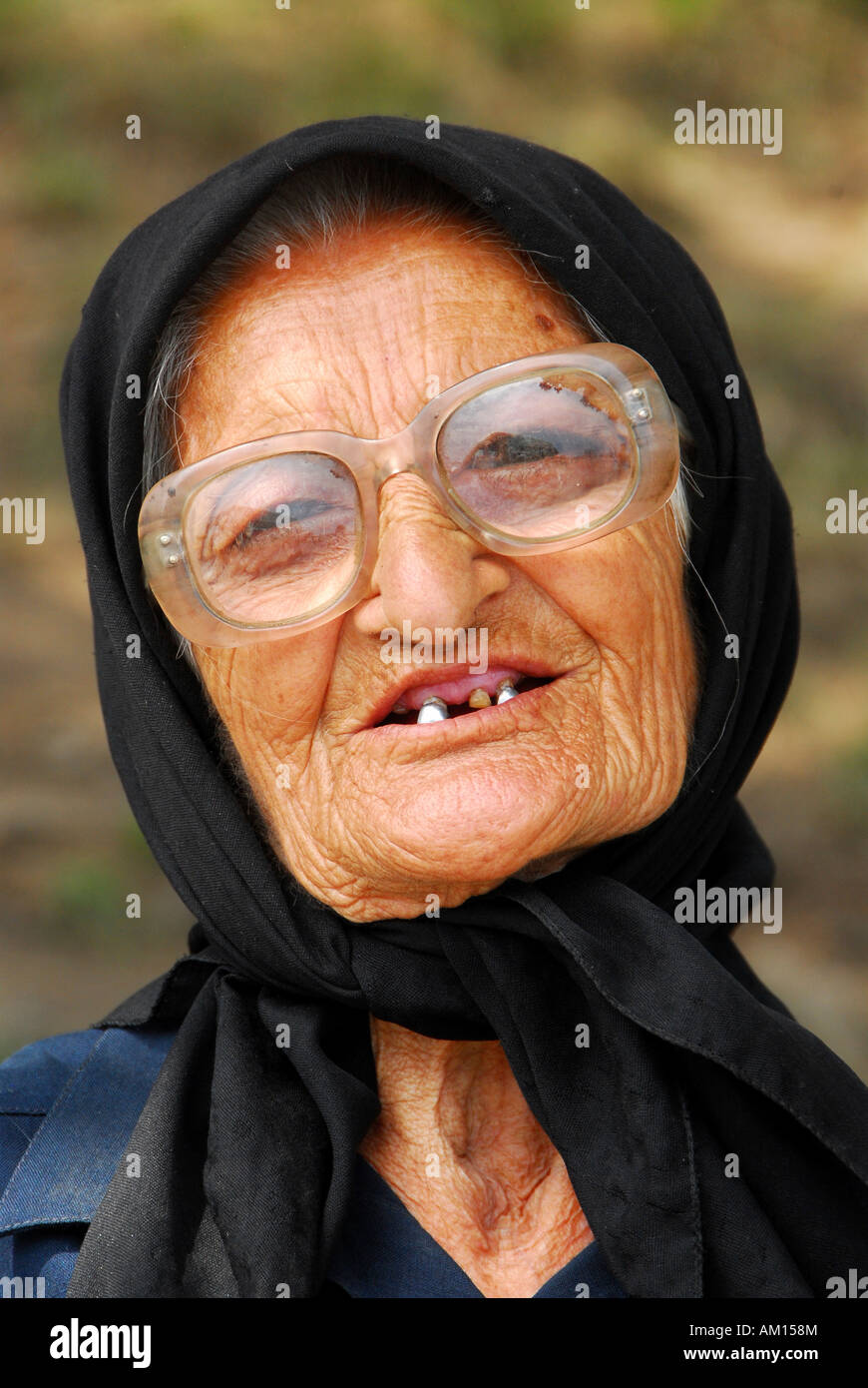 Old georgian woman with golden teeth, Gremi, Georgia Stock Photo