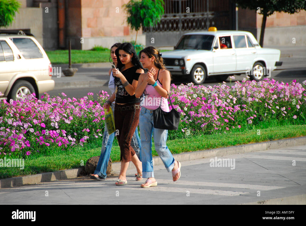 Young Armenians with mobile phone on Republic Square, Jerevan, Armenia Stock Photo