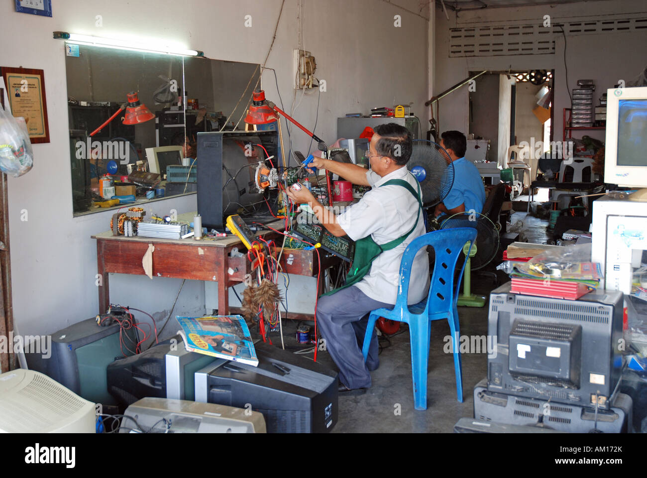 Repair shop for televisions, Surat, Thailand, Asia Stock Photo