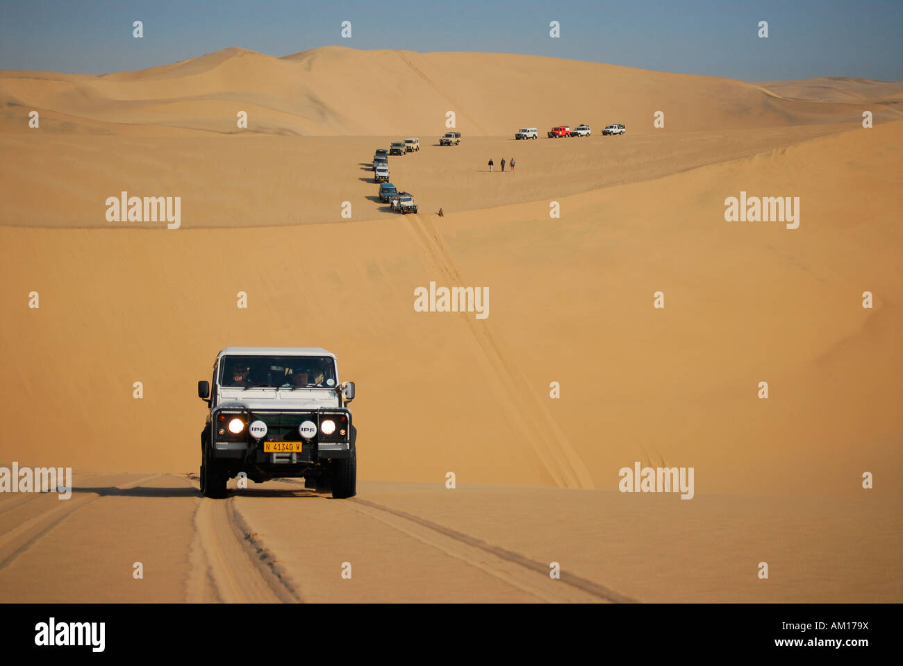 Jeeps in the dunes at Conceprion Bay, Diamond Area, Namibia Stock Photo