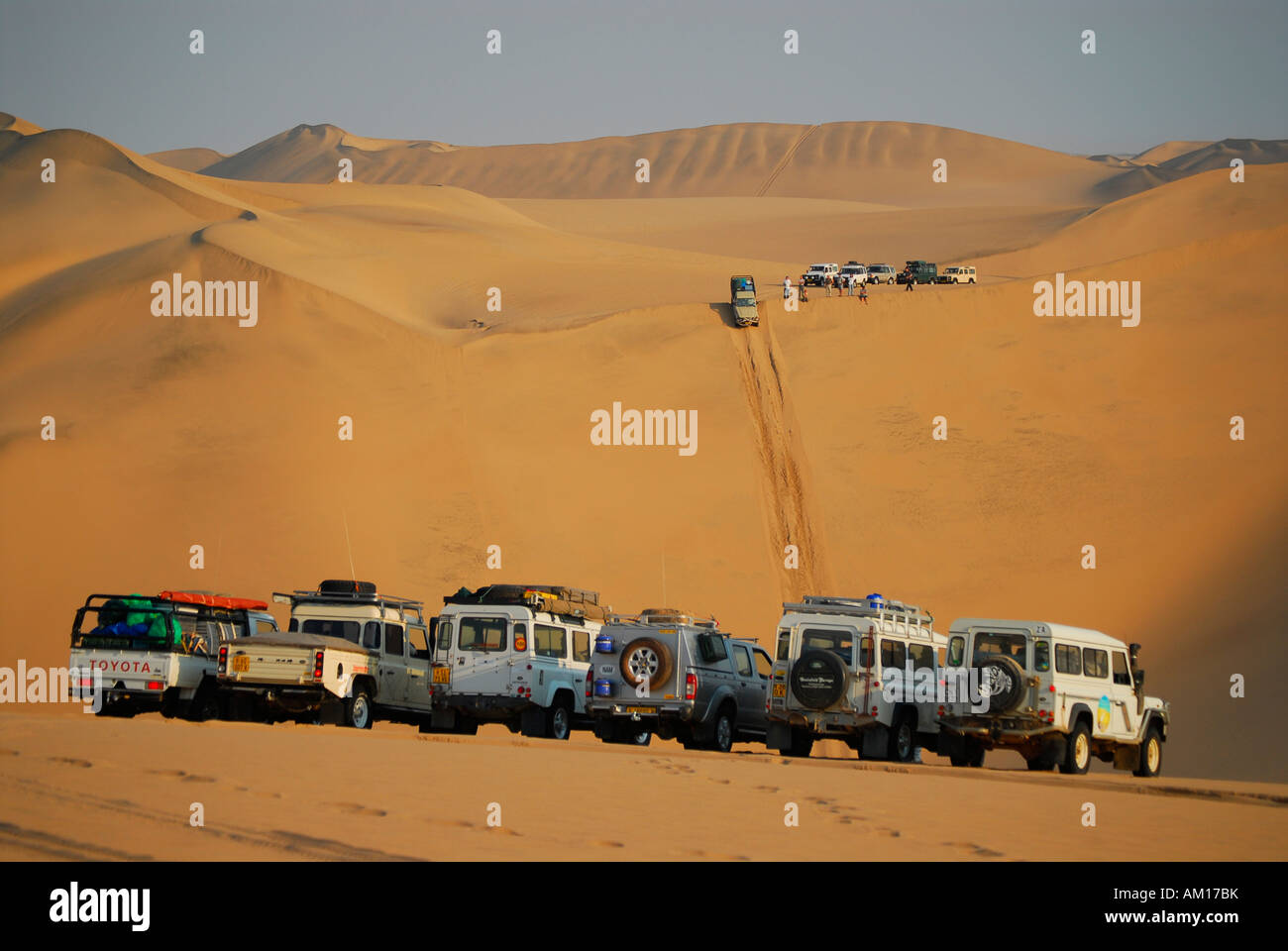 Jeeps in the dunes at Conception Bay, Diamond Area, Namibia Stock Photo