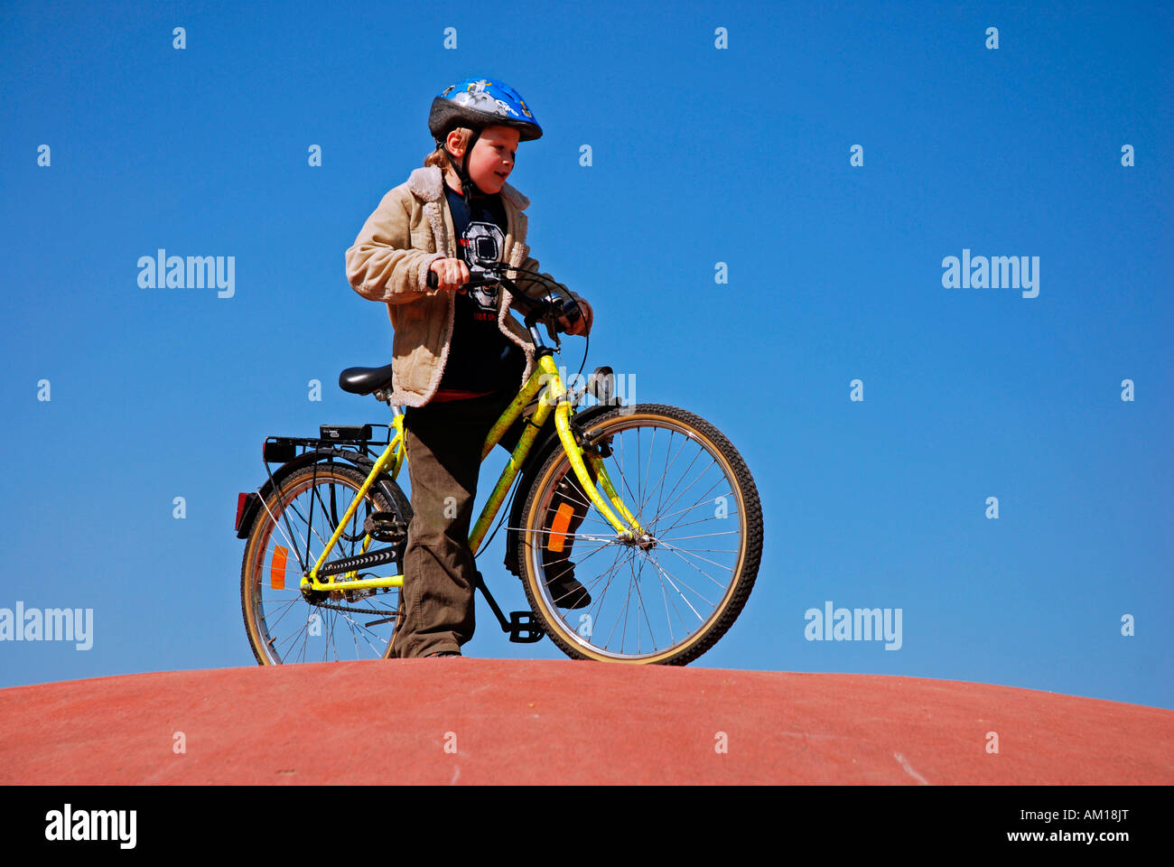 Seven-year-old boy on a bike, Cologne, Germany Stock Photo