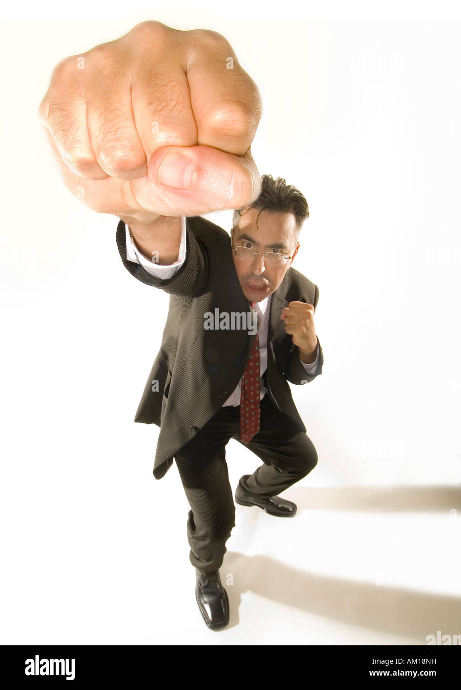 Angry businessman boxing Stock Photo