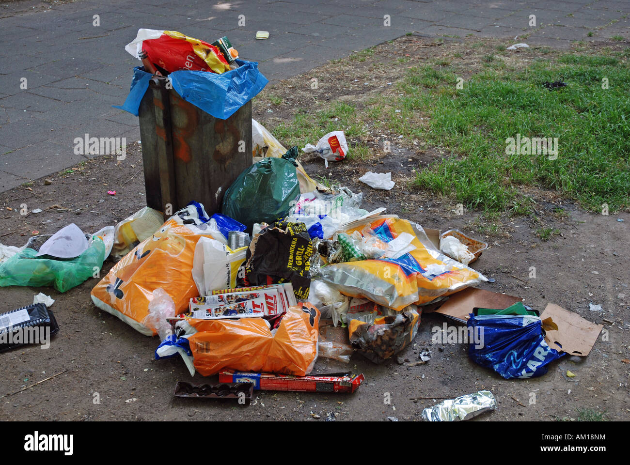 Full garbage can at the Rhine riverside, Cologne, North Rhine-Westphalia, Germany Stock Photo