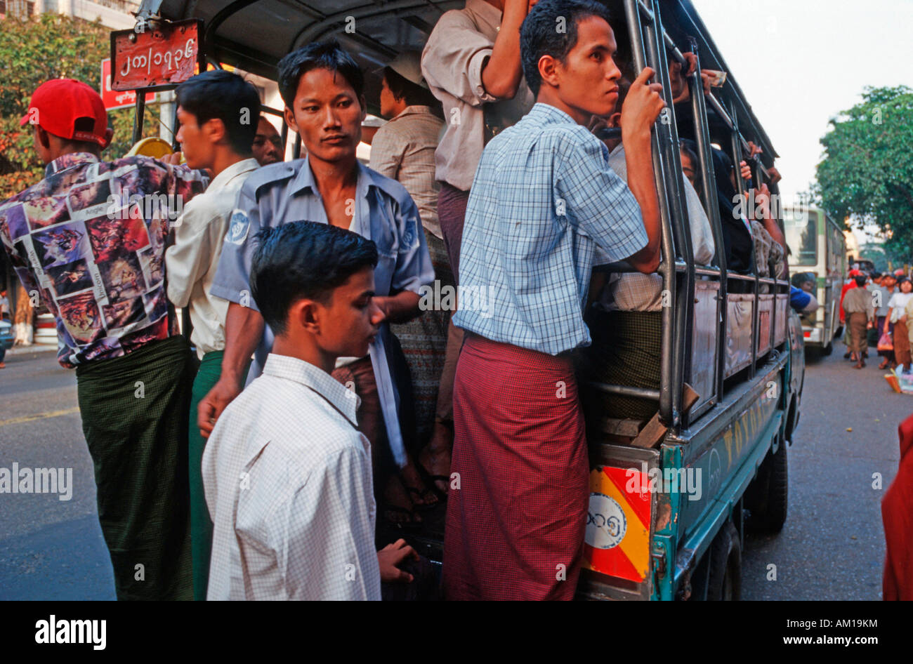 Crowded mini bus in Yangon, Burma Stock Photo