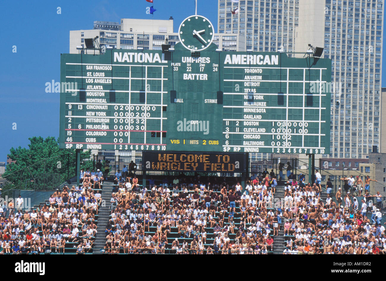 Long view of scoreboard and full bleachers during a professional