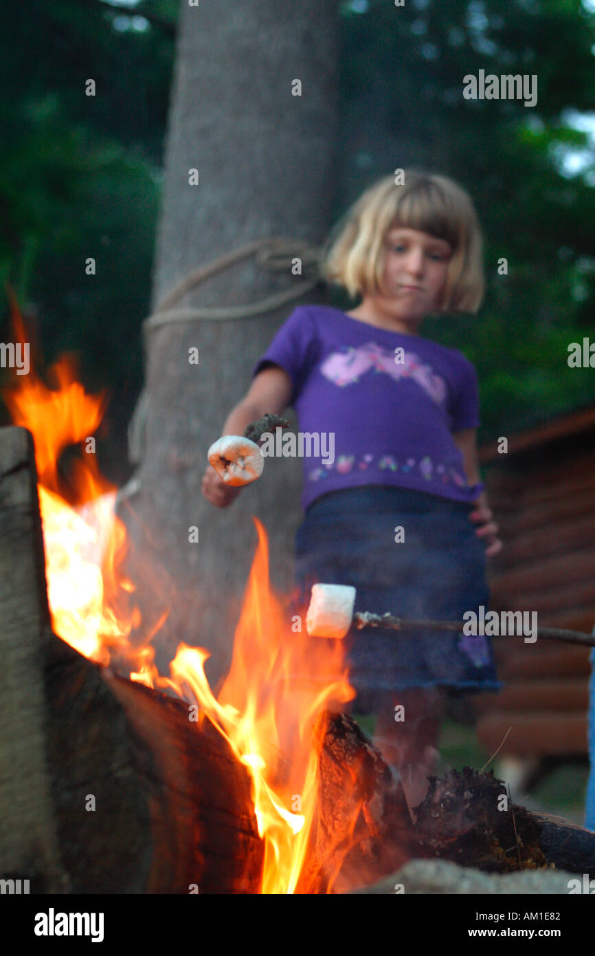 Girl Roasting Marshmallow Stock Photo