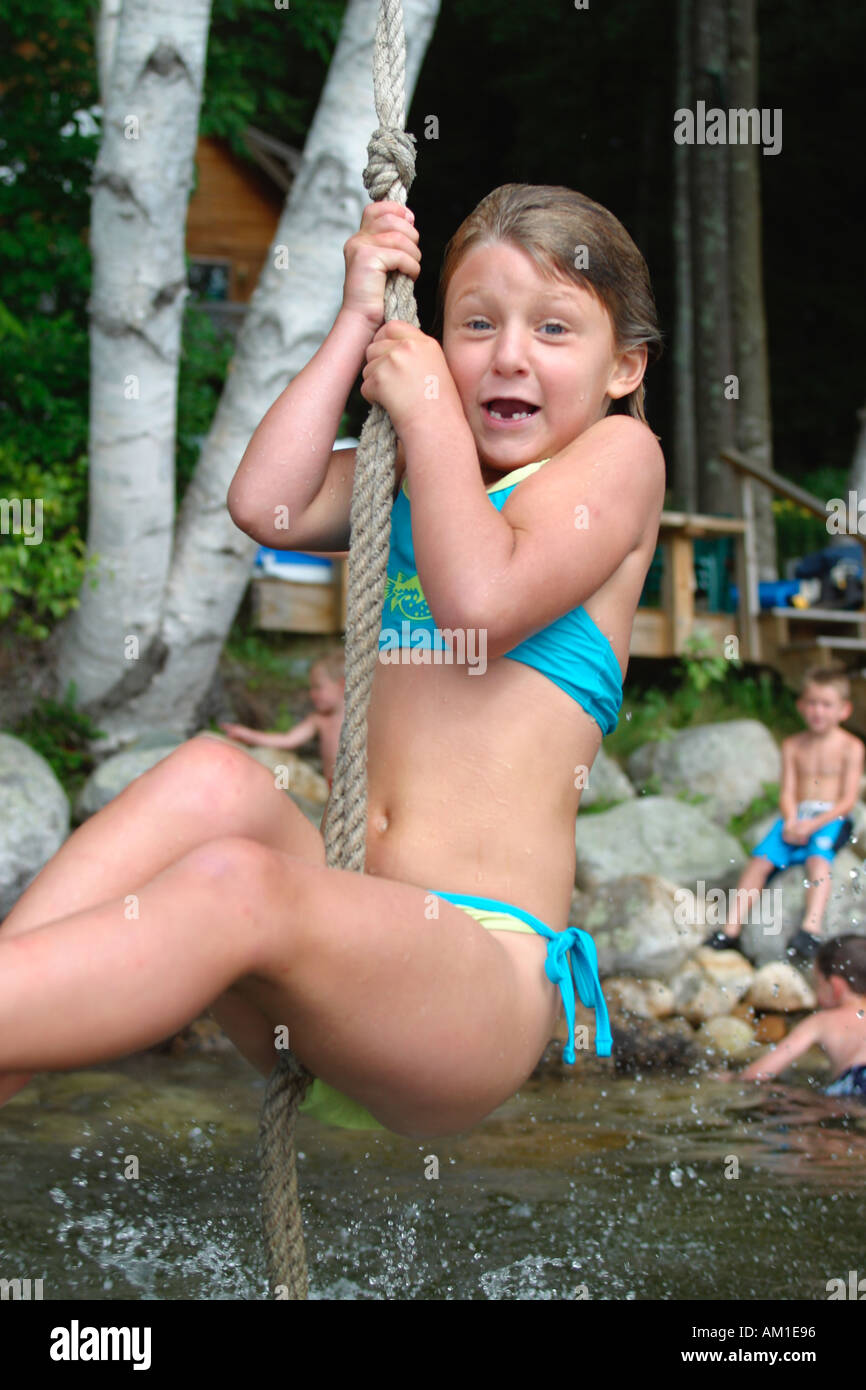 girl on Rope Swing Sebago Lakes Maine Stock Photo - Alamy